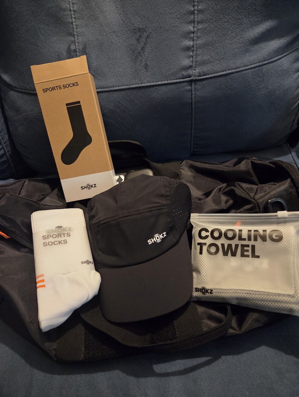 Shokz Running Bundle OpenFit Earbuds + Hat + Socks + Cooling Towel + Gym Bag